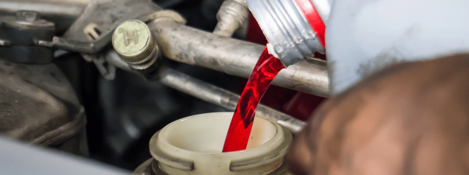 changing the transmission fluid to keep your car running