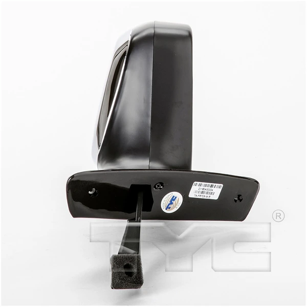 View of road through right mirror