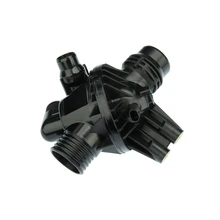ÜRO Parts 11537586783 Engine Coolant Thermostat / Water Inlet Assembly
